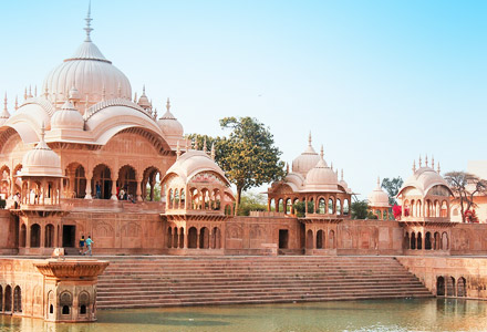 Kusum Sarovar, serene water body surrounded by lush greenery